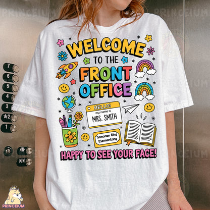 a woman wearing a t - shirt that says welcome to the front office