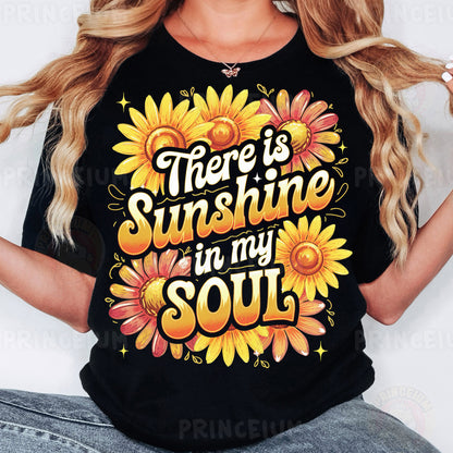 a woman wearing a black shirt that says there is sunshine in my soul