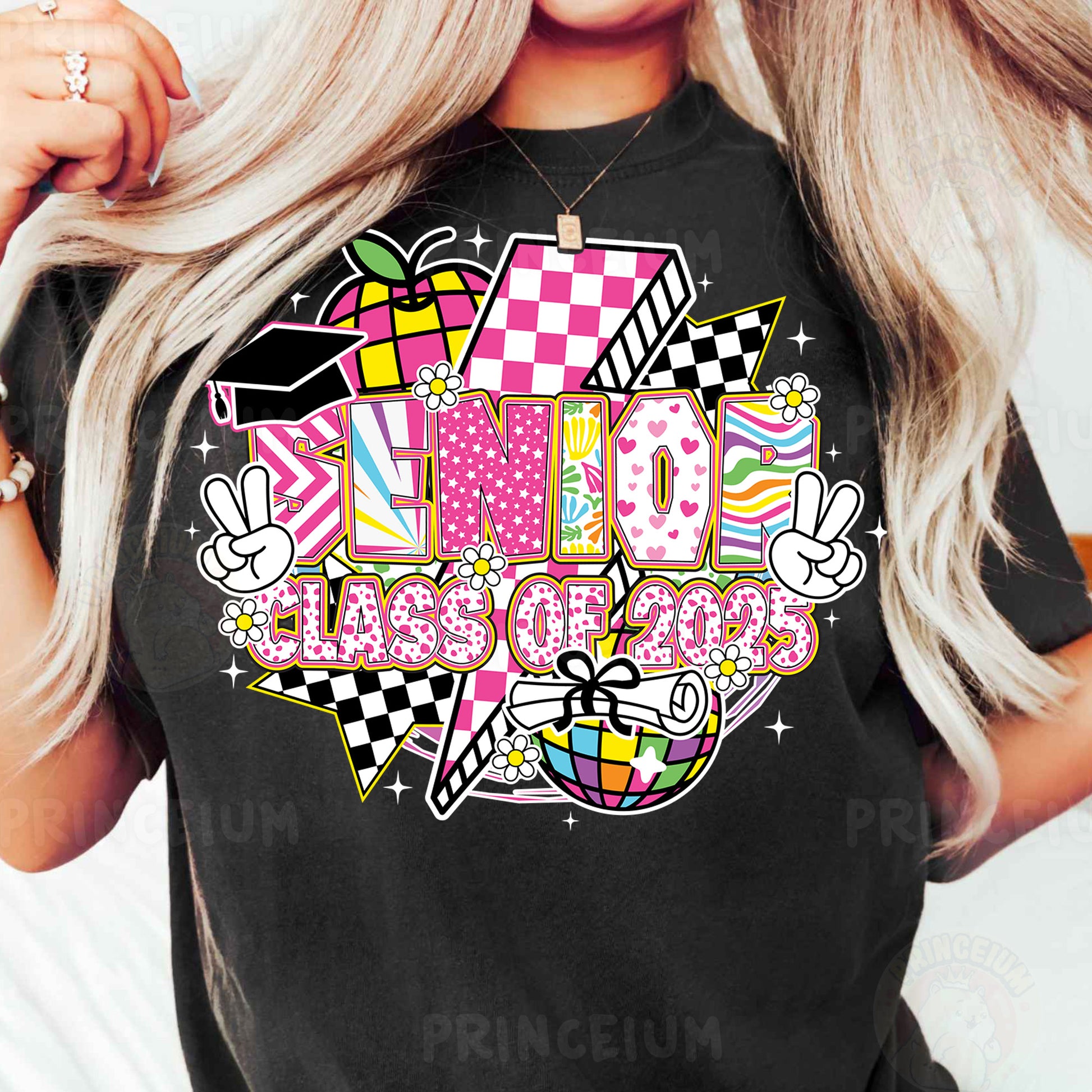 a woman wearing a black tshirt with a pink and white checkered design