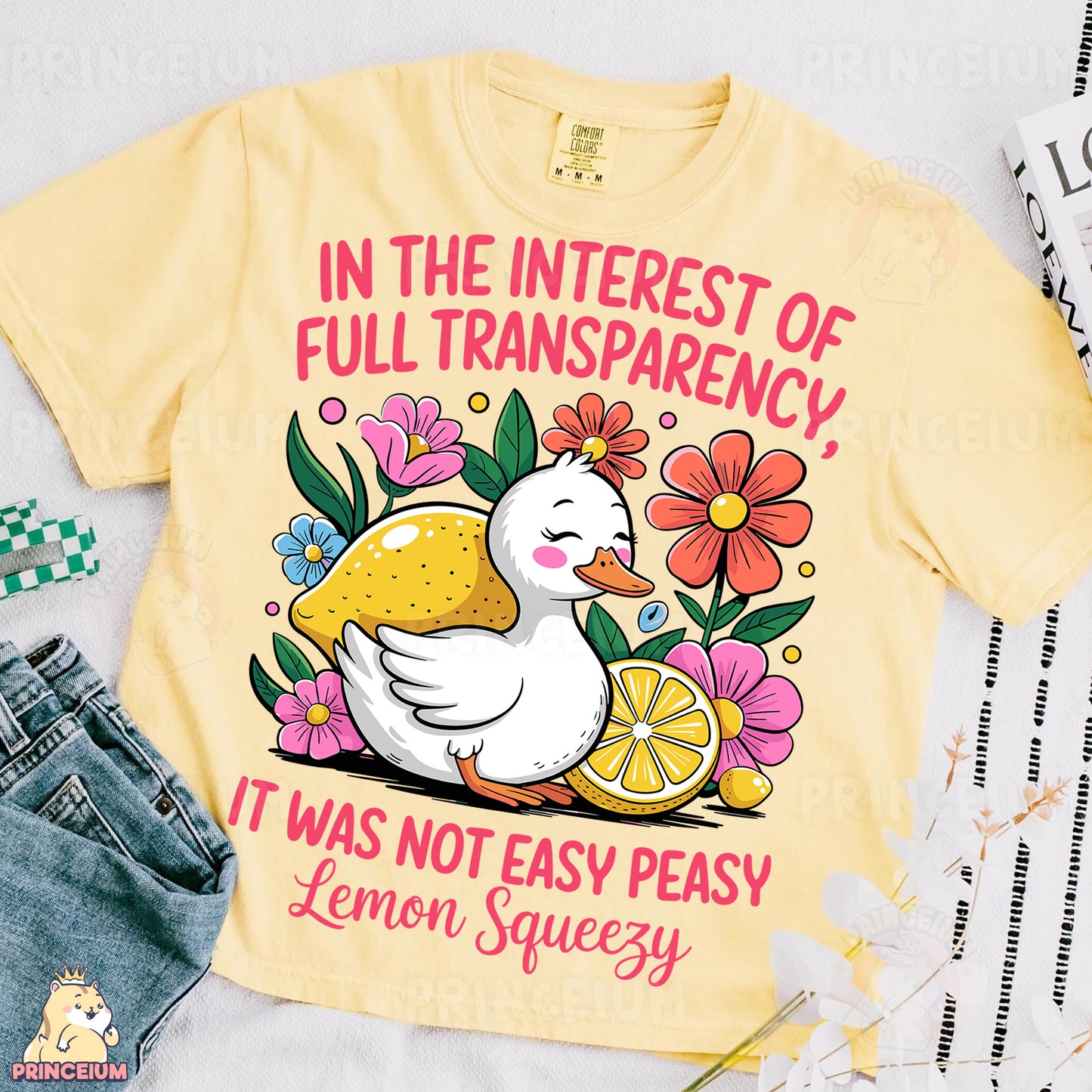 a t - shirt with a lemon and a duck on it