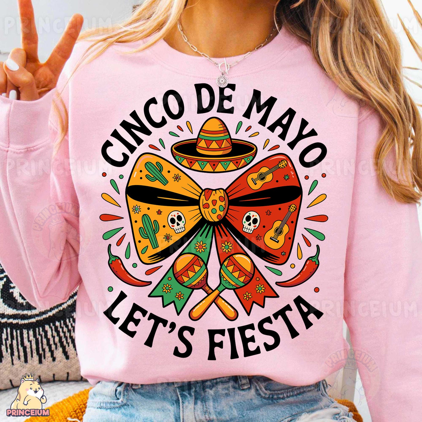 a woman wearing a pink shirt that says cinco de mayo let's fiesta