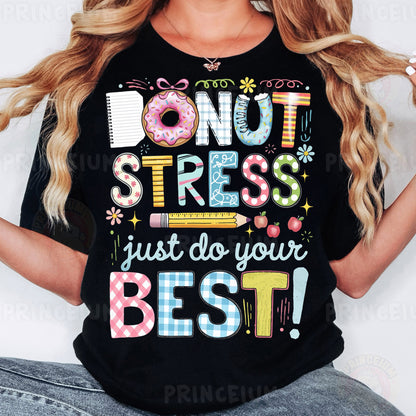 a woman wearing a black t - shirt that says donut stress just do your