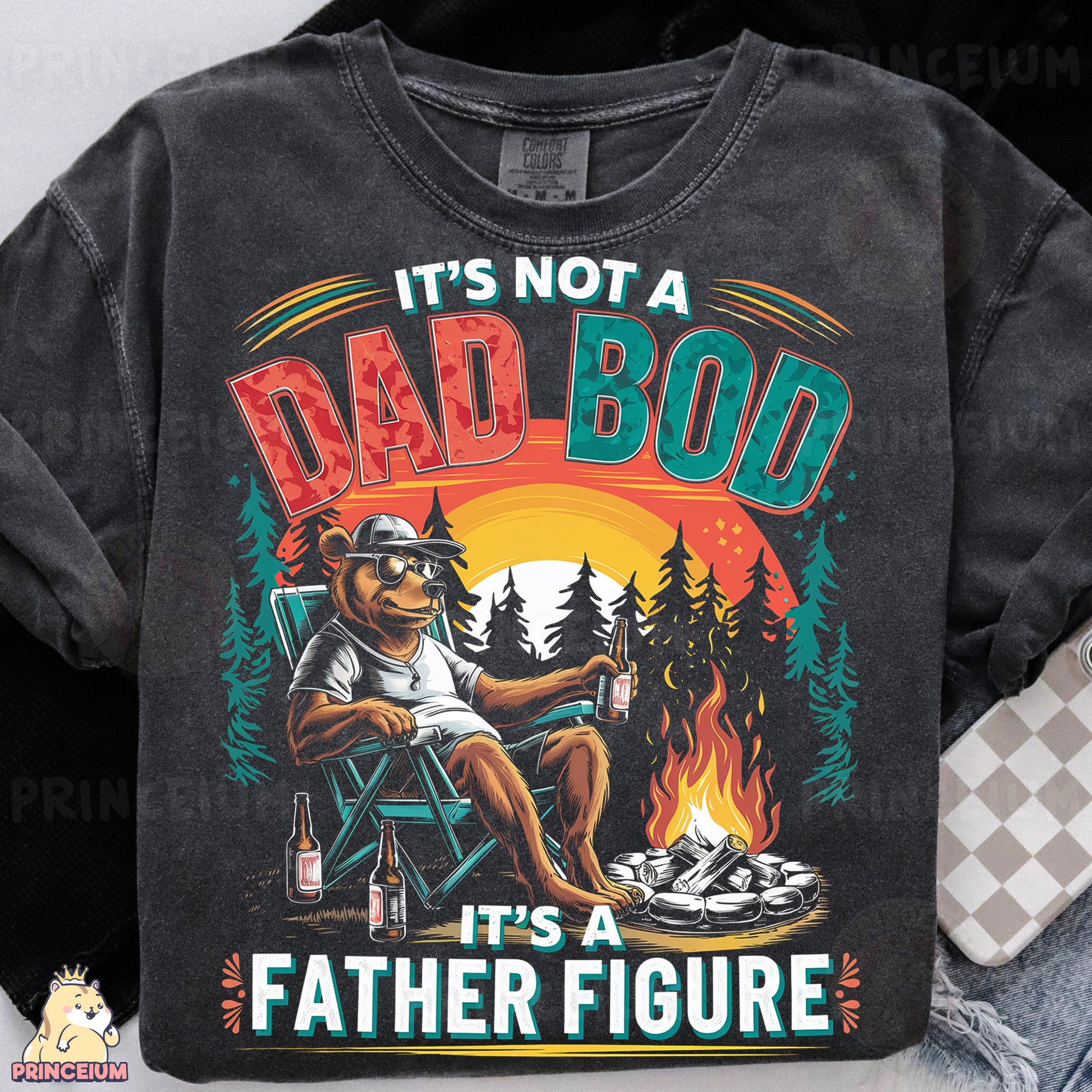 a t - shirt with a picture of a bear sitting in a chair with a