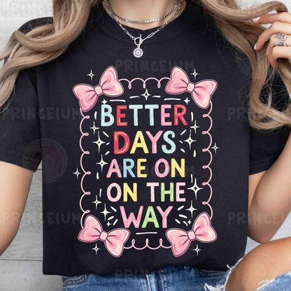 a woman wearing a t - shirt that says better days are on the way