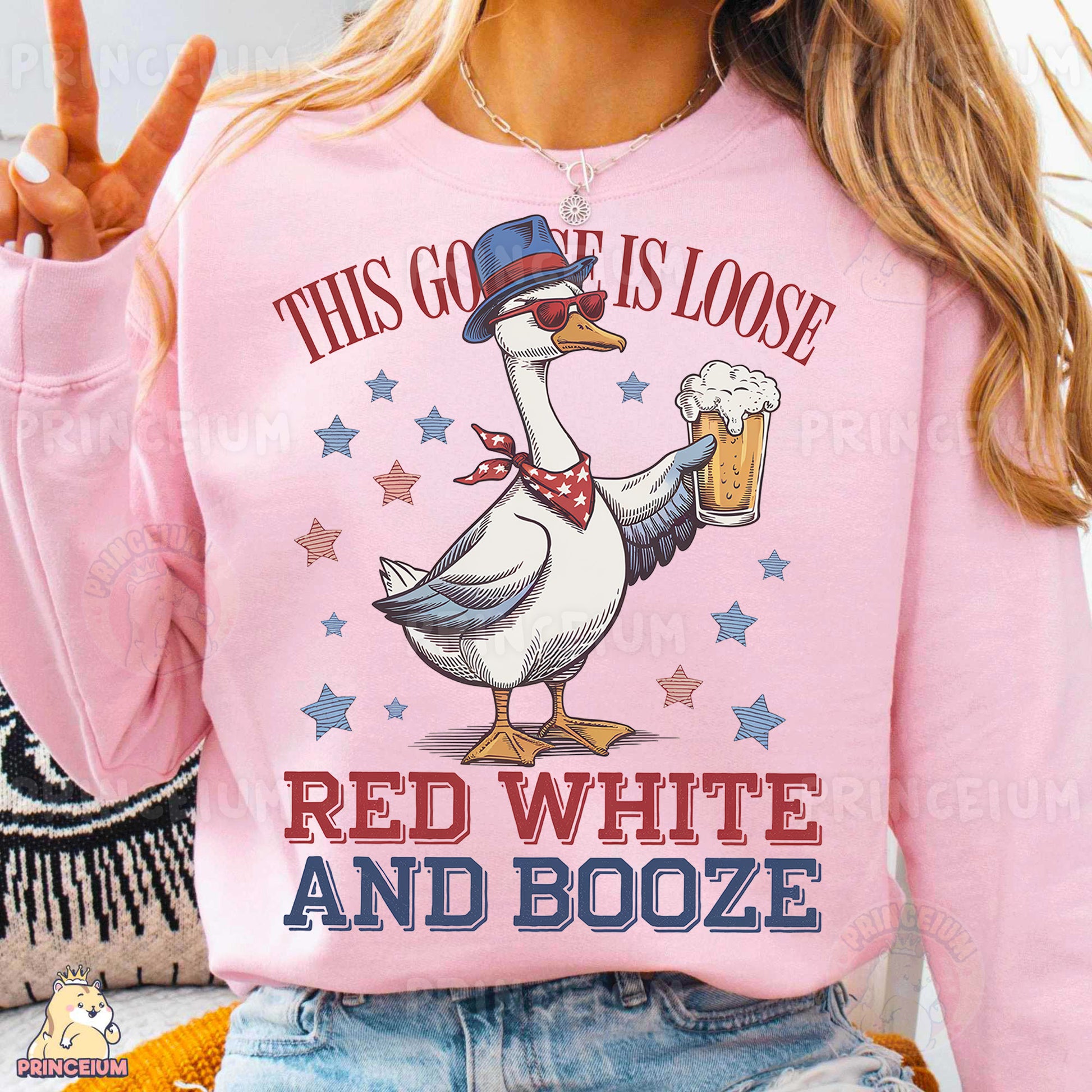 a woman wearing a pink shirt with a goose on it