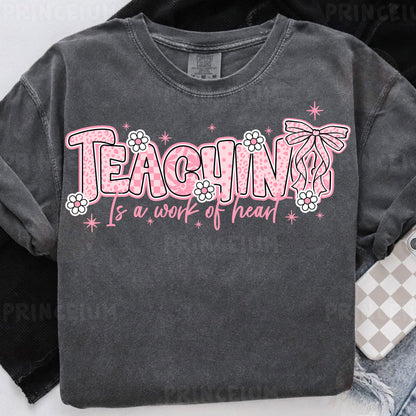 a t - shirt that says teaching is a work of heart