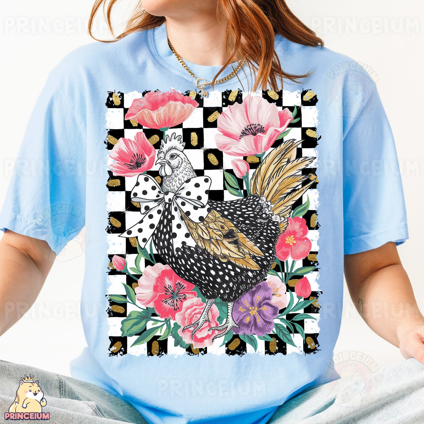 a woman wearing a blue shirt with a chicken on it