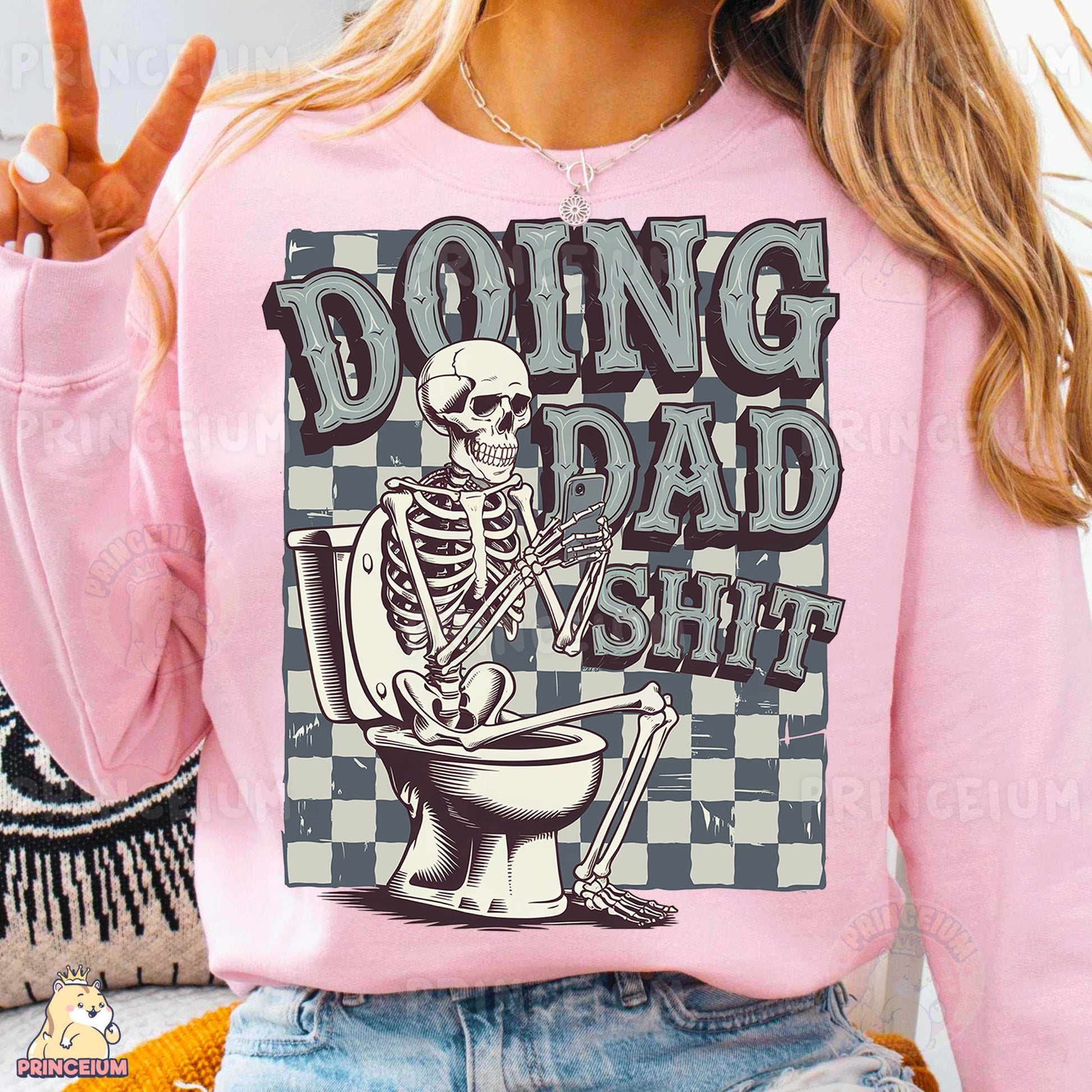 a woman wearing a pink shirt with a skeleton on it