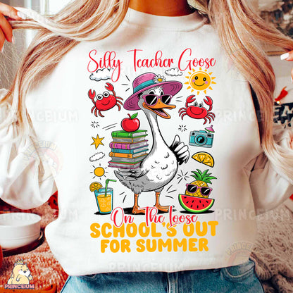 a woman wearing a white shirt with an image of a duck wearing a hat and