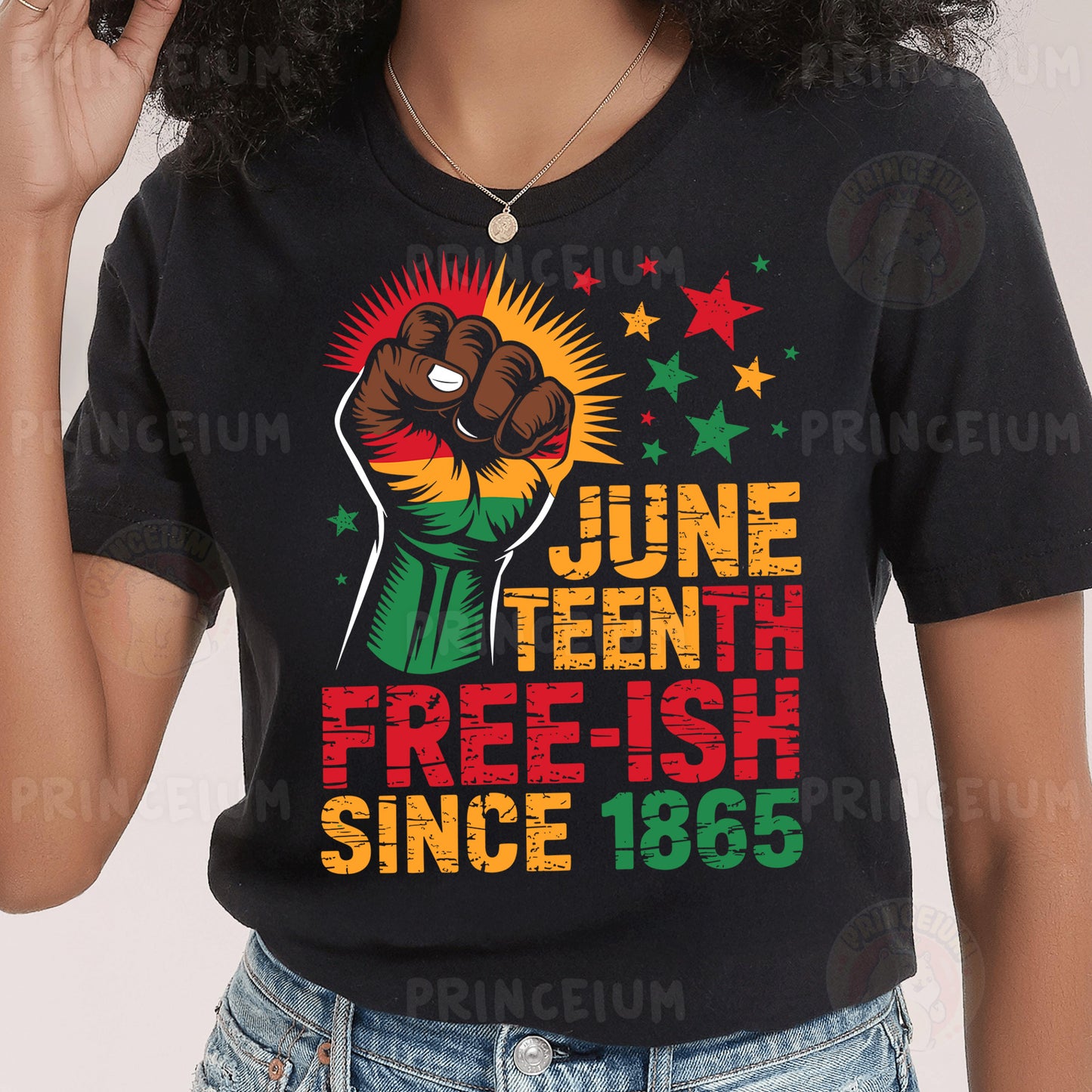 a woman wearing a black tshirt with a fist on it