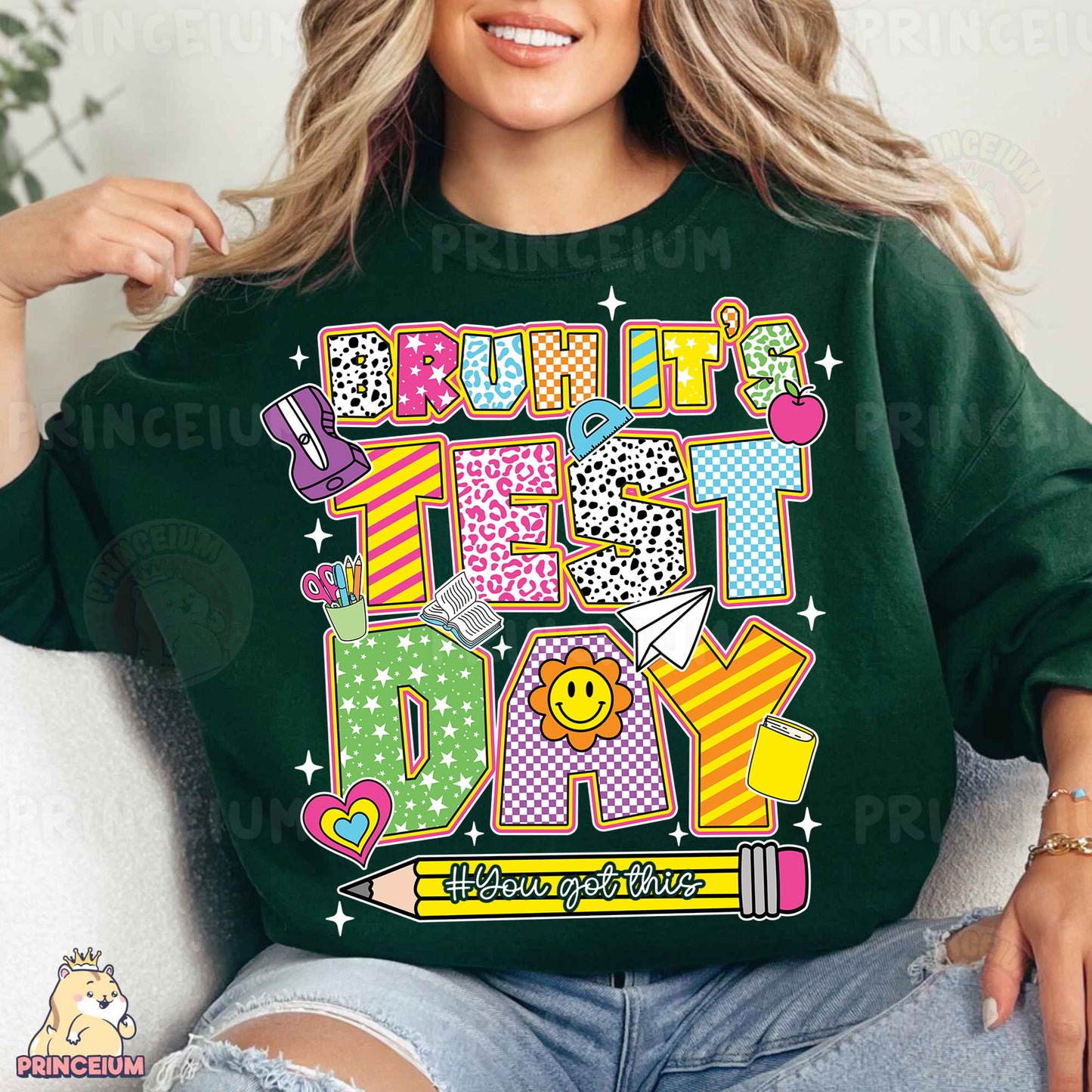 a woman sitting on a couch wearing a green shirt