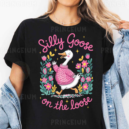 a woman wearing a t - shirt that says silly goose on the loose