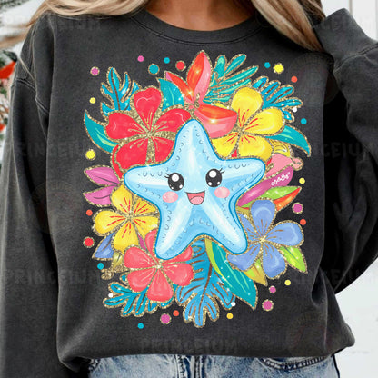 a woman wearing a black sweatshirt with a starfish on it