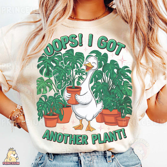 a woman wearing a t - shirt with a goose holding a potted plant