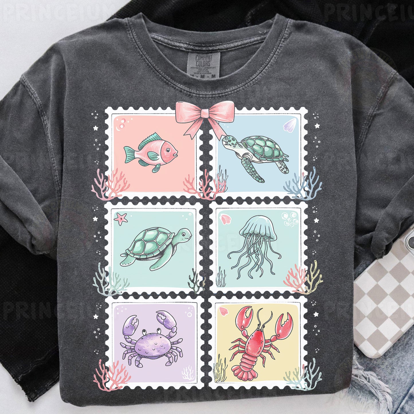 a t - shirt with a picture of sea animals on it