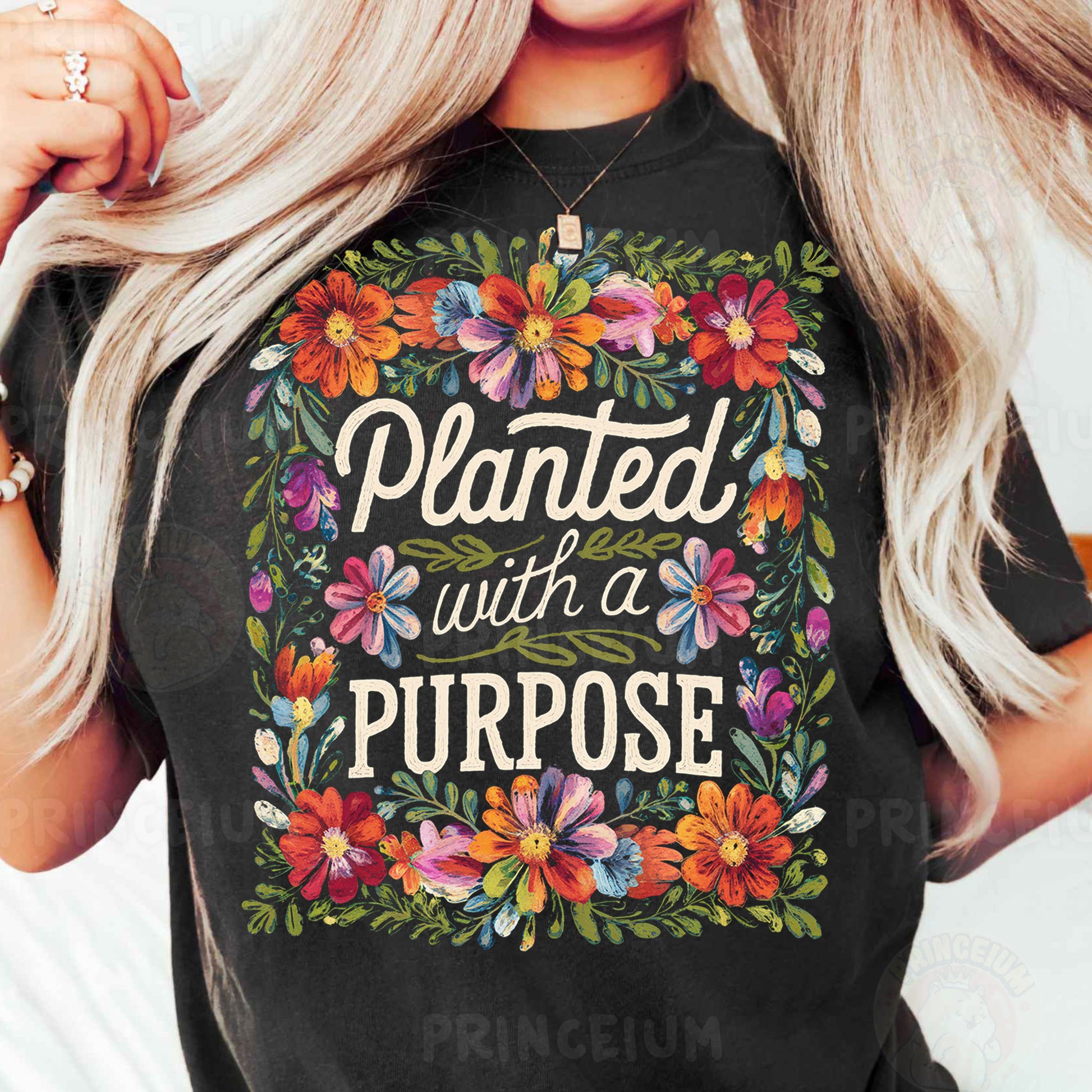 a woman wearing a black t - shirt that says planted with a purpose