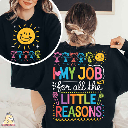 a woman wearing a t - shirt that says, my job is all the little