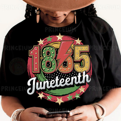 a person wearing a black shirt and a hat holding a cell phone