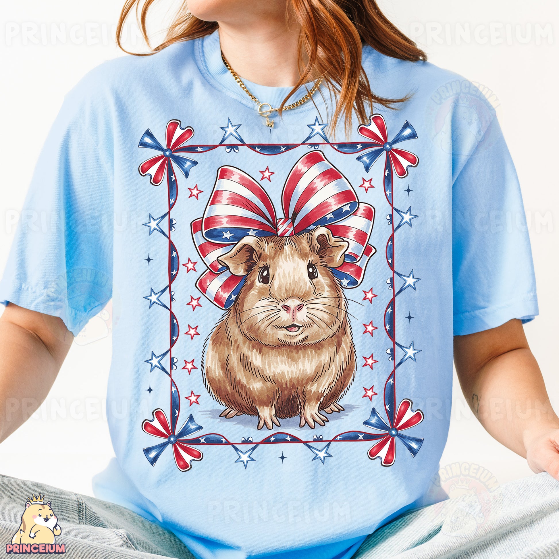 a woman wearing a blue shirt with a picture of a hamster on it