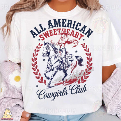 a woman wearing a white t - shirt that says, all american sweetheart cowgirl