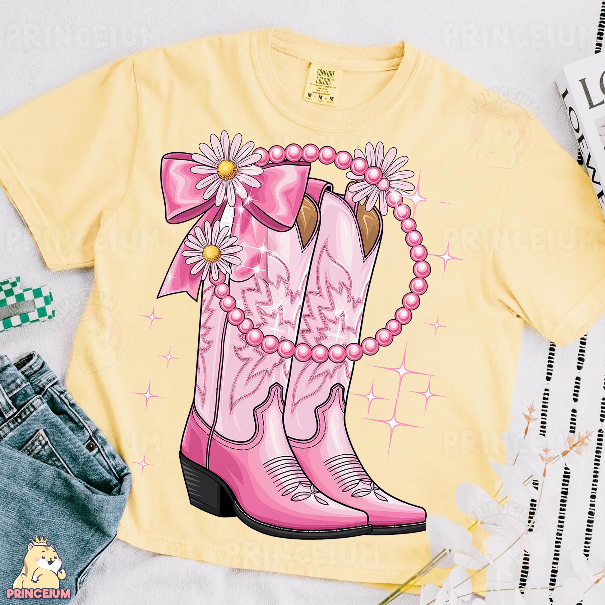 a yellow shirt with a pink cowboy boot and daisies on it