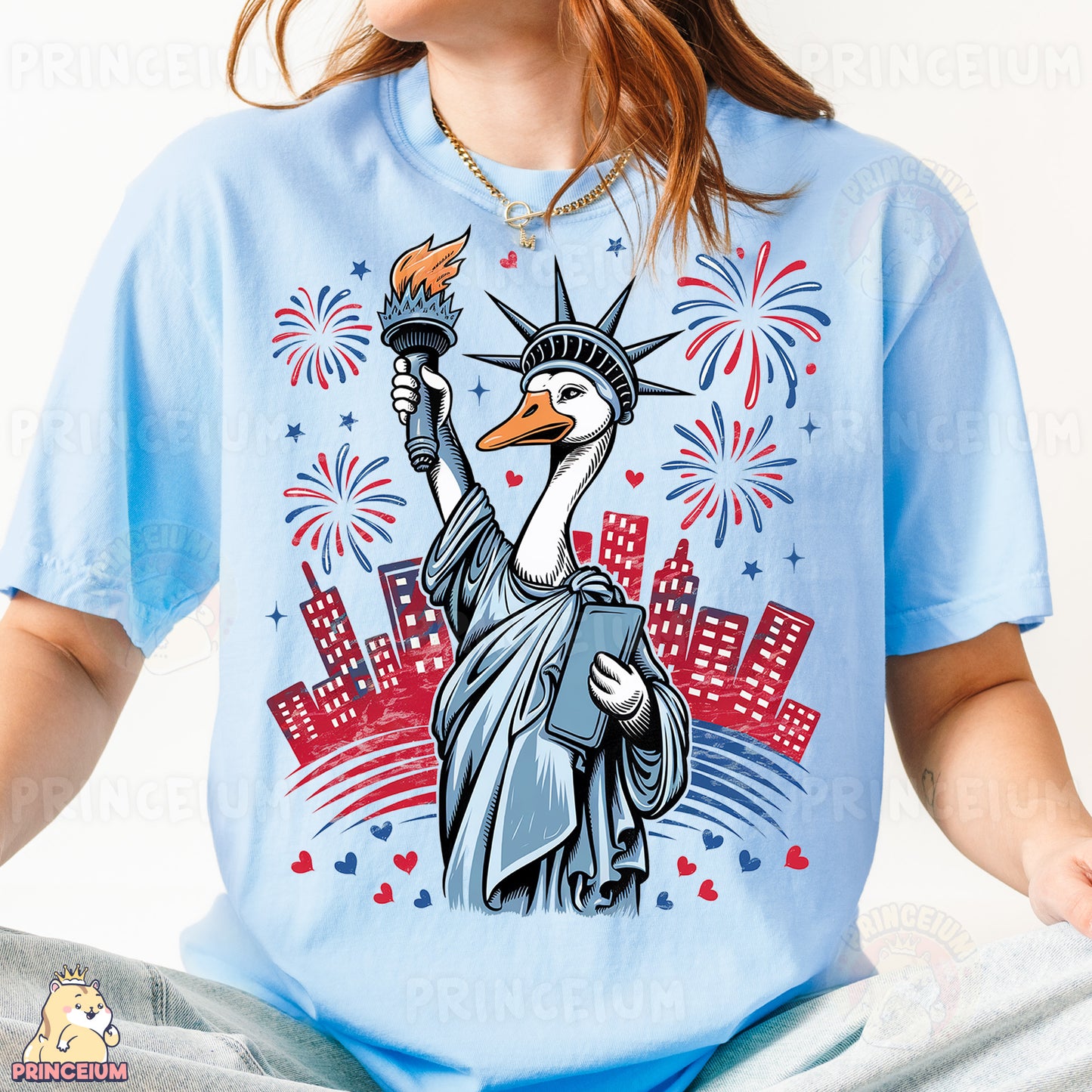 a woman wearing a blue shirt with a statue of liberty on it