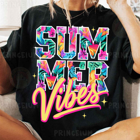 a woman sitting on a couch wearing a black shirt with the words summer vibes
