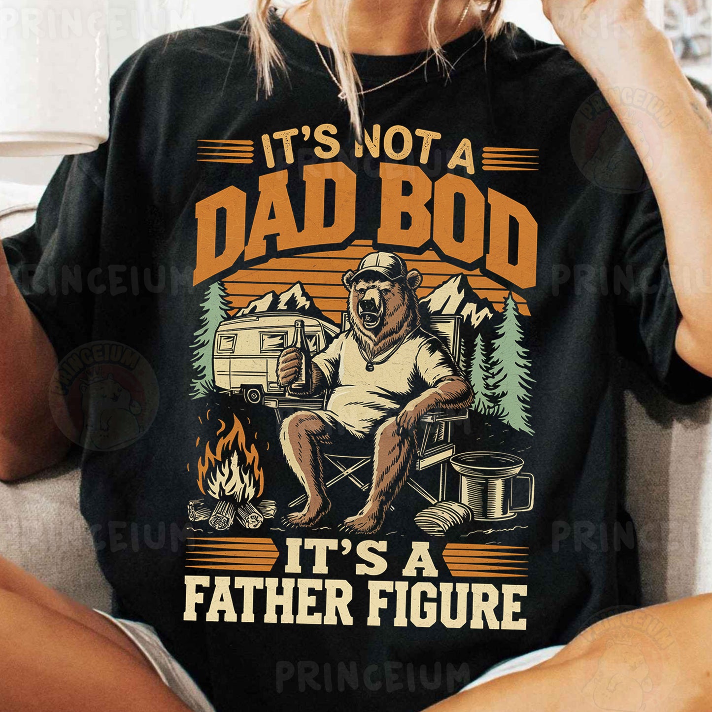 a woman sitting on a couch wearing a shirt that says it's not a