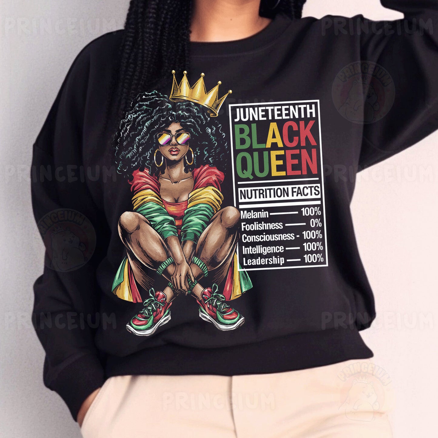 a woman wearing a black sweatshirt with a black queen on it
