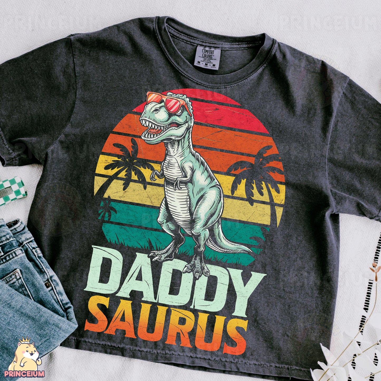 a t - shirt that says daddy saurus with a dinosaur on it