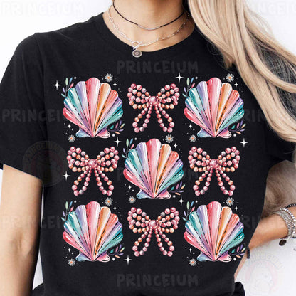 a woman wearing a black t - shirt with pink, green, blue, and