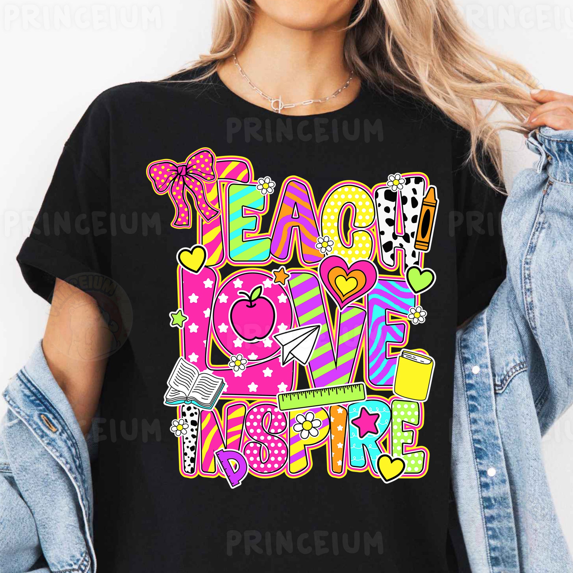 a woman wearing a t - shirt that says teach love inspire