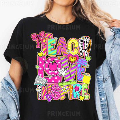 a woman wearing a t - shirt that says teach love inspire