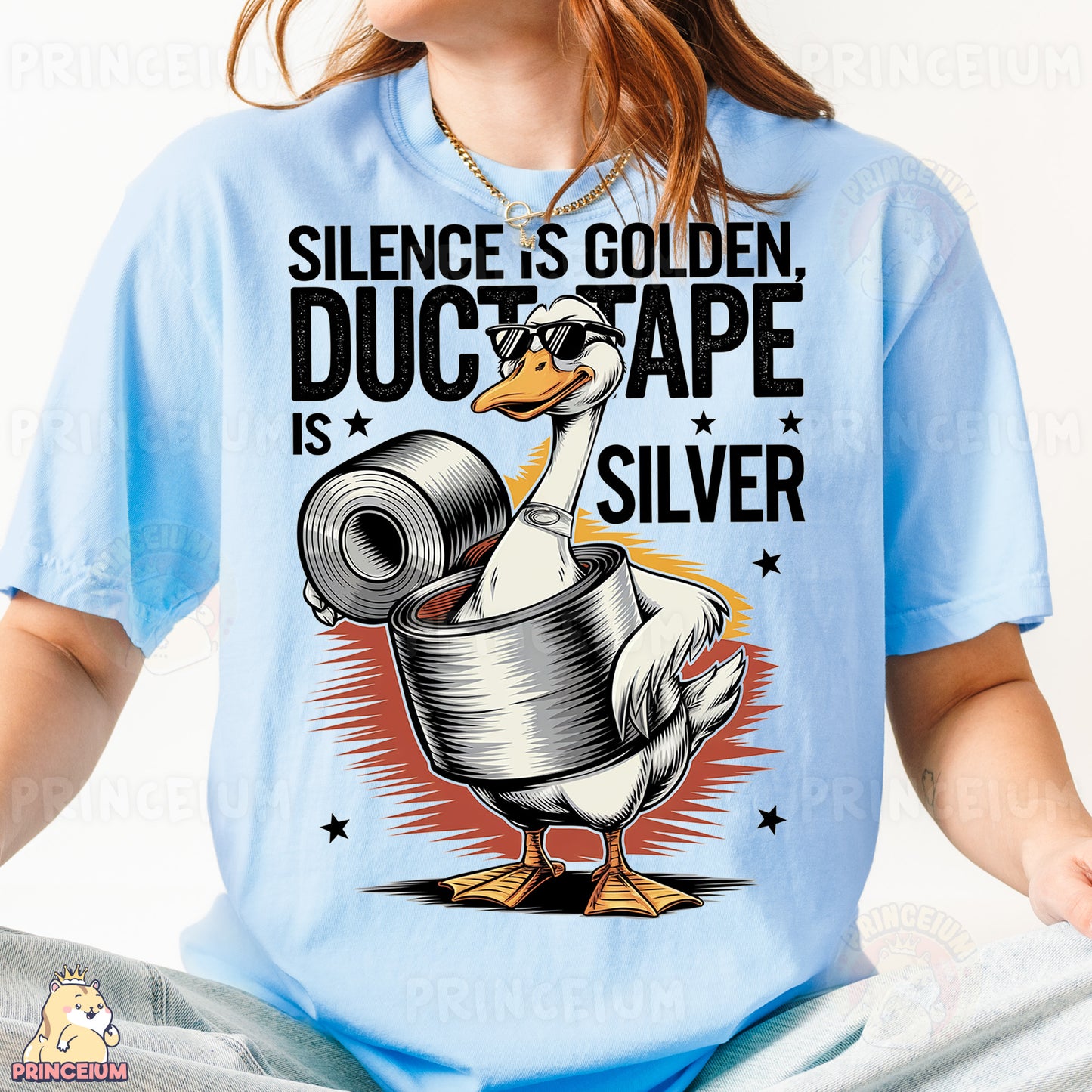 a woman wearing a blue shirt with a duck on it