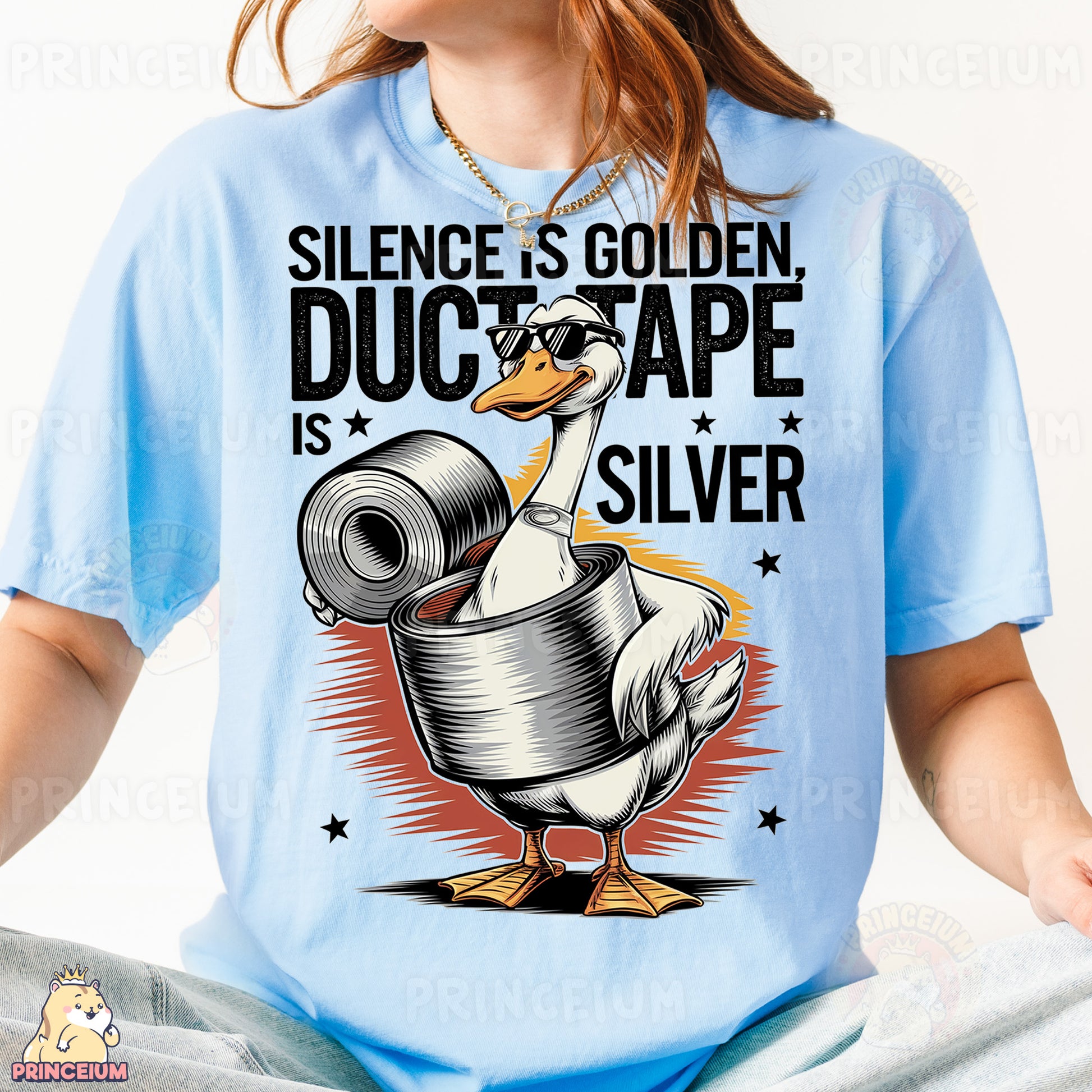 a woman wearing a blue shirt with a duck on it