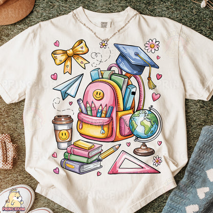 a t - shirt with a picture of a backpack and books