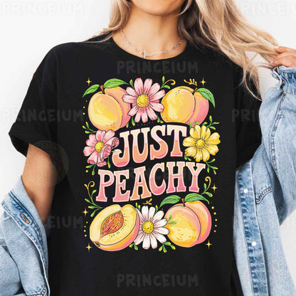 a woman wearing a t - shirt that says just peachy
