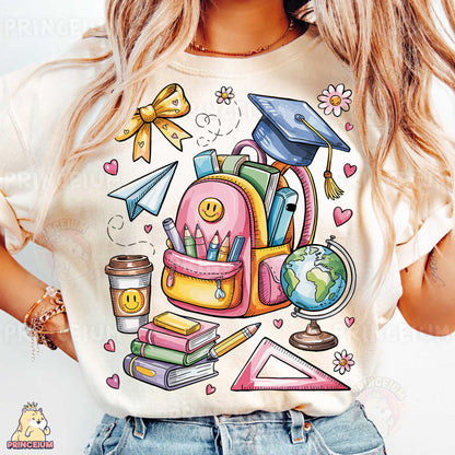 a woman wearing a t - shirt with a picture of a backpack, books,