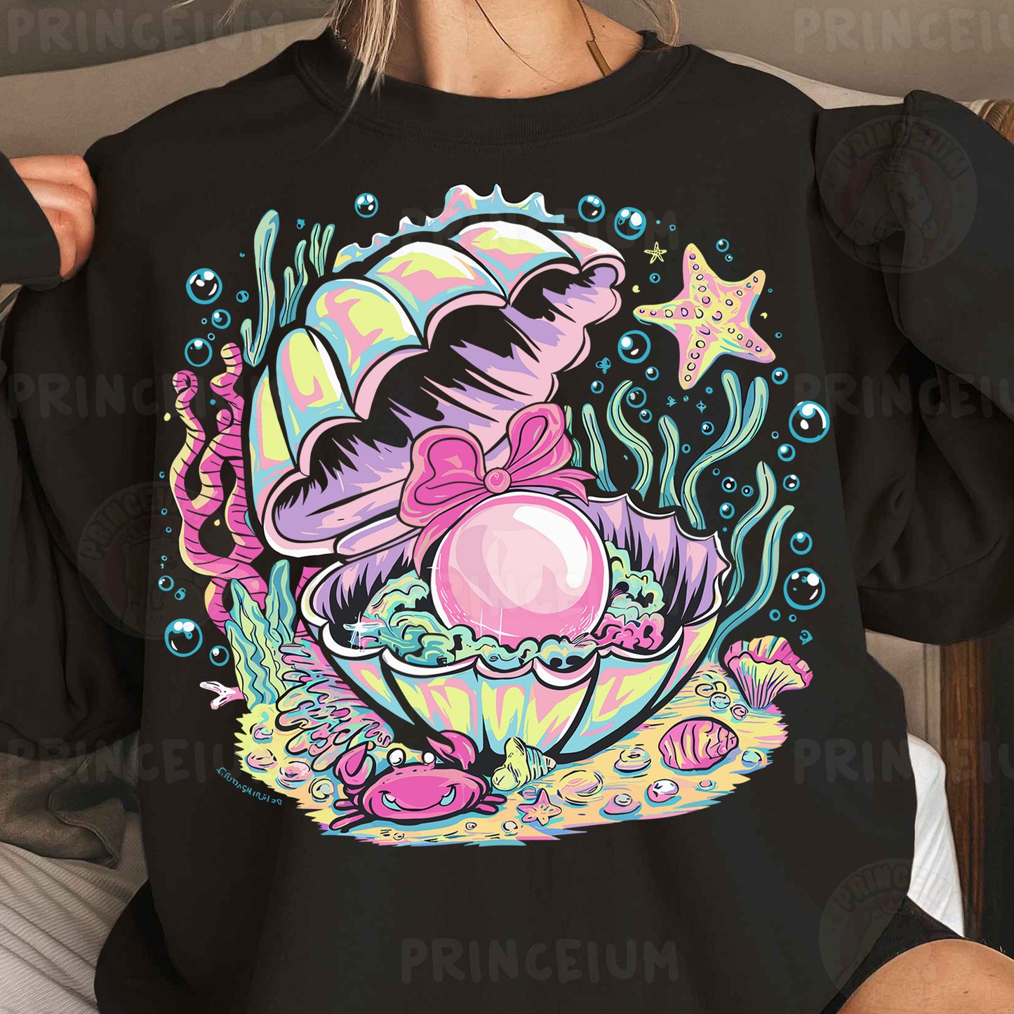 a woman wearing a black shirt with an image of an octopus on it
