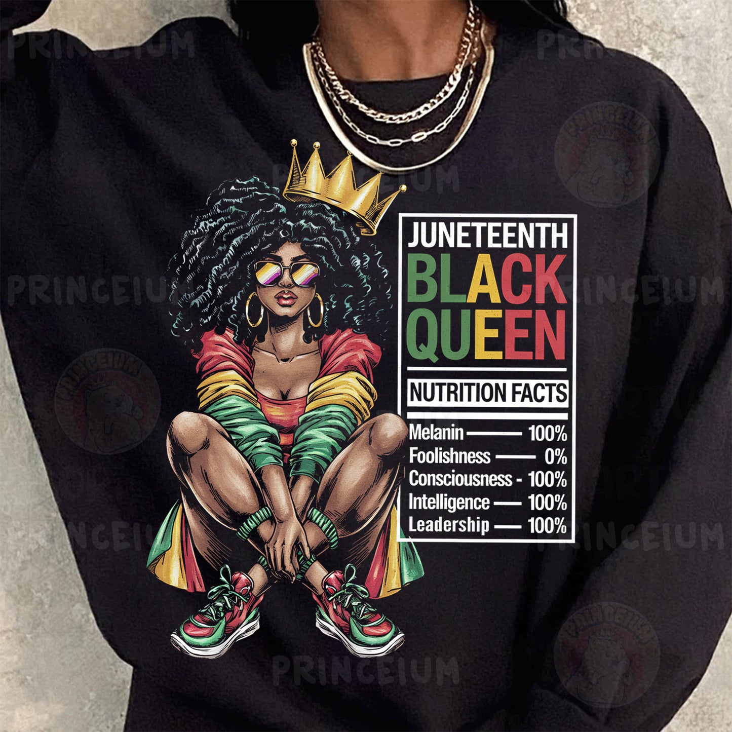 a woman wearing a black sweatshirt with a black queen graphic on it