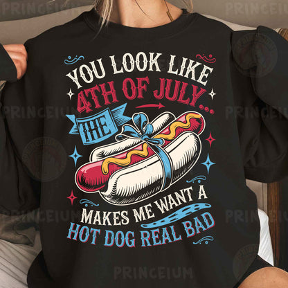 a woman wearing a black shirt with a hot dog on it
