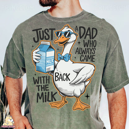 a man wearing a shirt with a duck holding a carton of milk