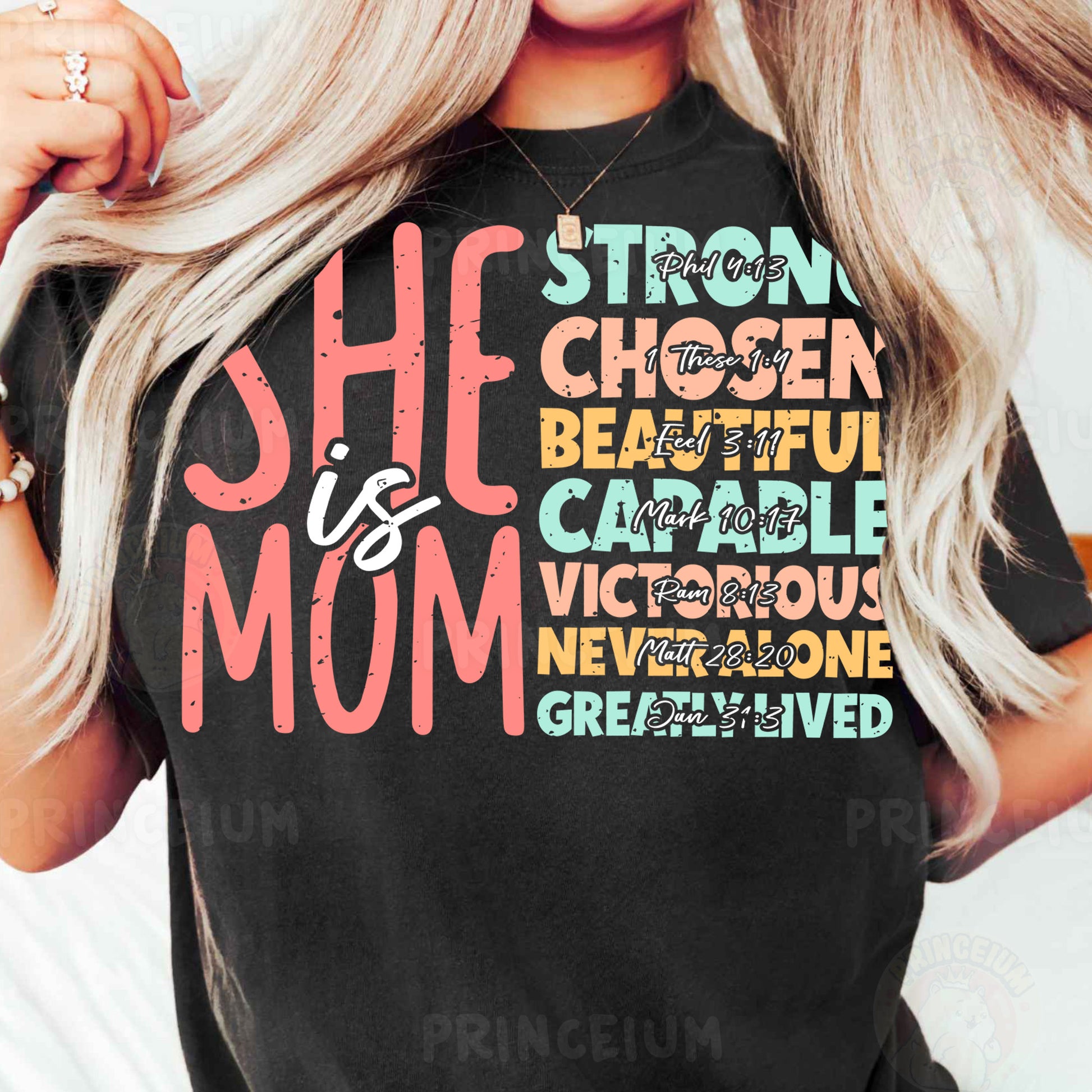a woman wearing a black shirt that says she is a mom