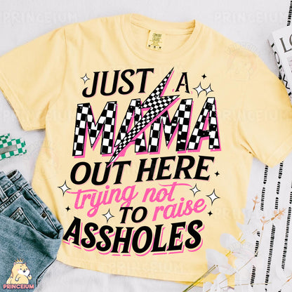 a t - shirt that says just a mama out here trying to raise asholes