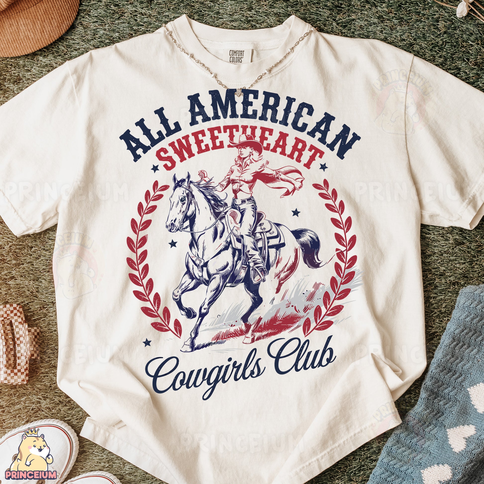a white t - shirt with an image of a cowboy riding a horse
