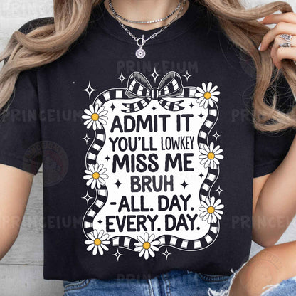 a woman wearing a black t - shirt that says admit it you'll '