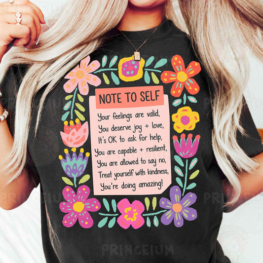 a woman wearing a t - shirt with a note to self on it