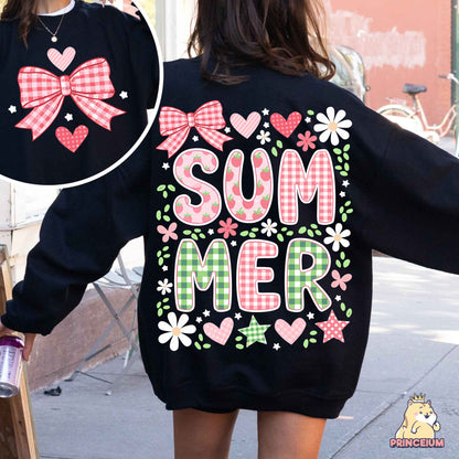 a woman walking down a street wearing a black sweatshirt