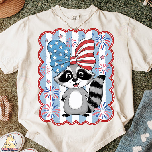 a t - shirt with a raccoon wearing an american flag hat