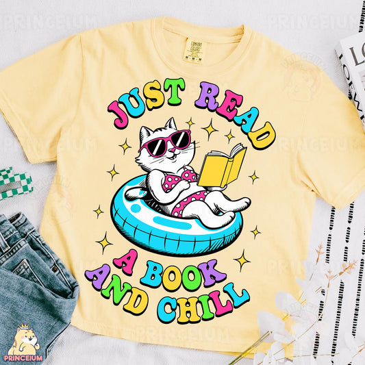 a t - shirt with a cat reading a book and wearing sunglasses